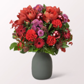 Premiumstrauß Winterblüte mit Premiumvase & Ferrero Giotto 3er